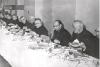 Archbishop Jordan having dinner with several Redemptorist Priests