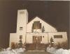 Exterior of Sacred Heart Church, Edson decorated for Christmas