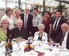 Archbishop MacNeil and the people at his table for a gala event