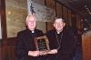 Archbishop MacNeil  and Archbishop Collins receiving CHAA award