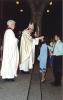 Archbishop Collins anointing with Oil of Catechumens at Easter Vigil Mass