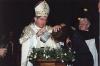 Archbishop Collins baptizing a catechumen during Easter Vigil