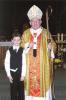 Archbishop Collins with Matthew Casey after his First Holy Communion in Tofield, Alberta