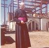 Msgr. Joseph M. Malone in front of St. Joseph's Basilica