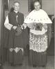 Co-adjutor Archbishop MacDonald (left) and Archbishop O'Leary (right) standing in bishop's vestments