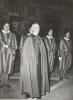 Archbishop MacDonald standing in front of four members of the Swiss Guard in Rome