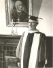 Archbishop MacDonald dressed in traditional cap and gown prior to receiving his Bachelor of Law degree from the University of Alberta