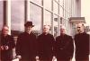 Archbishop MacDonald, Coadjutor Archbishop Jordan, and three other priests gathered at the Edmonton International Airport