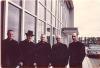 Archbishop MacDonald, Coadjutor Archbishop Jordan, and three other priests gathered at the Edmonton International Airport