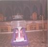 Archbishop MacDonald laying in a coffin in St. Joseph's Cathedral