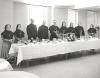Archbishop Jordan, Cardinal Leger of Montreal two unidentified priests, and several Grey Nuns at what appears to be the head table for a celebratory dinner