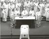 Archbishop MacNeil and priests at the time of Consecration during the Funeral Mass of Archbishop Jordan at St. Joseph's Cathedral
