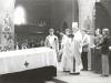 Archbishop MacNeil blessing the coffin of Archbishop Jordan