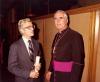 Archbishop MacNeil and an unidentified man standing together and talking, while in Rome for his Ad Limina visit