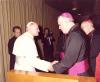 Pope John Paul II and Archbishop MacNeil shaking hands during Archbishop MacNeil's Ad Limina visit to Rome