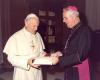 Archbishop MacNeil presenting Pope John Paul II with a gift, a book, during his Ad Limina visit to Rome