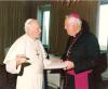 Archbishop MacNeil presenting Pope John Paul II with a gift during his Ad Limina visit to Rome