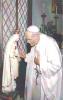 Prayer card picturing Pope John Paul II praying in front of a statue of Mary