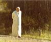 Long shot of Pope John Paul II walking at Elk Island National Park