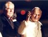 Medium close-up of Pope John Paul II and Archbishop MacNeil at Namao Base