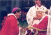 Archbishop Collins receiving the Pallium from Pope John Paul II