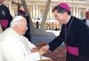 Archbishop Collins shaking hand of Pope John Paul II when in Rome to receive the Pallium