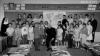 Msgr. Romeo Ketchen with a group of school children