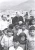 Archbishop Jordan and a crowd of children in Peru